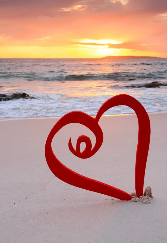 love with red heart on the seashore